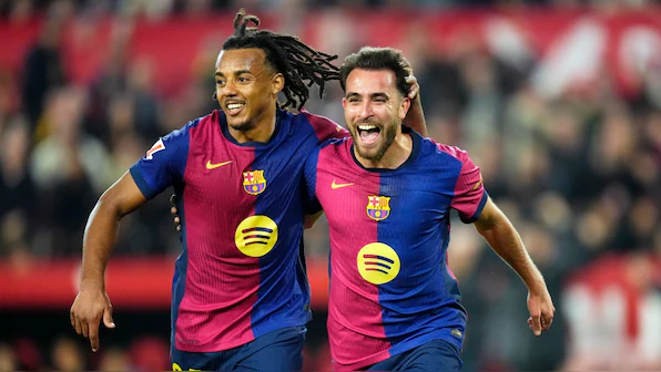 Ten-man Barcelona thump Sevilla 4-1 to stay firm with Real Madrid and Atletico in title race